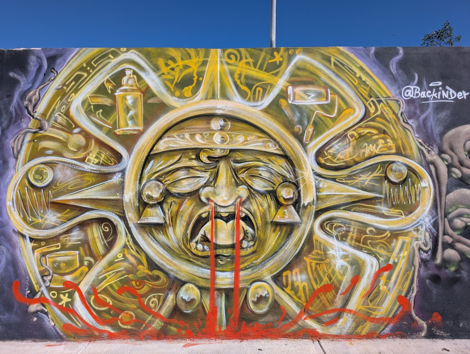 Aztec sun stone of spray cans