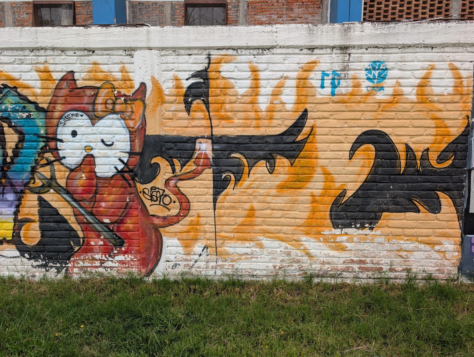Gata diabla entre llamas