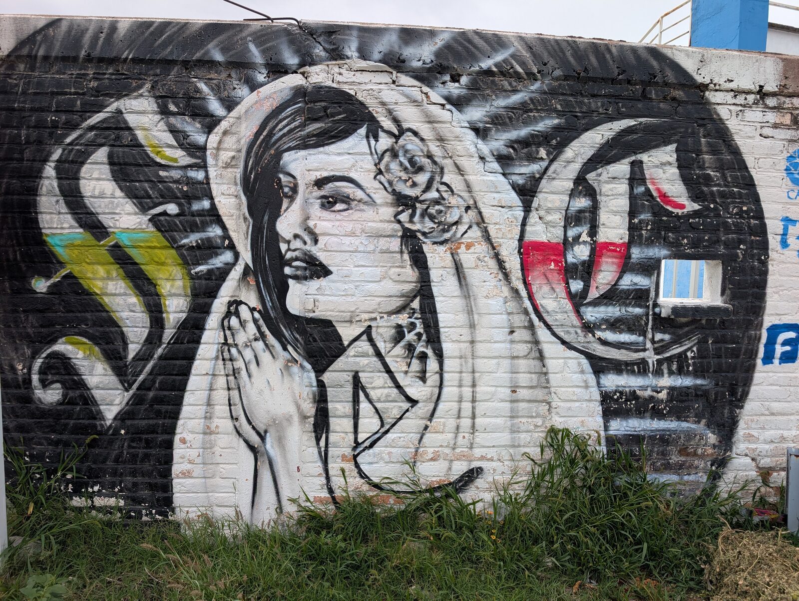 Praying woman in a veil