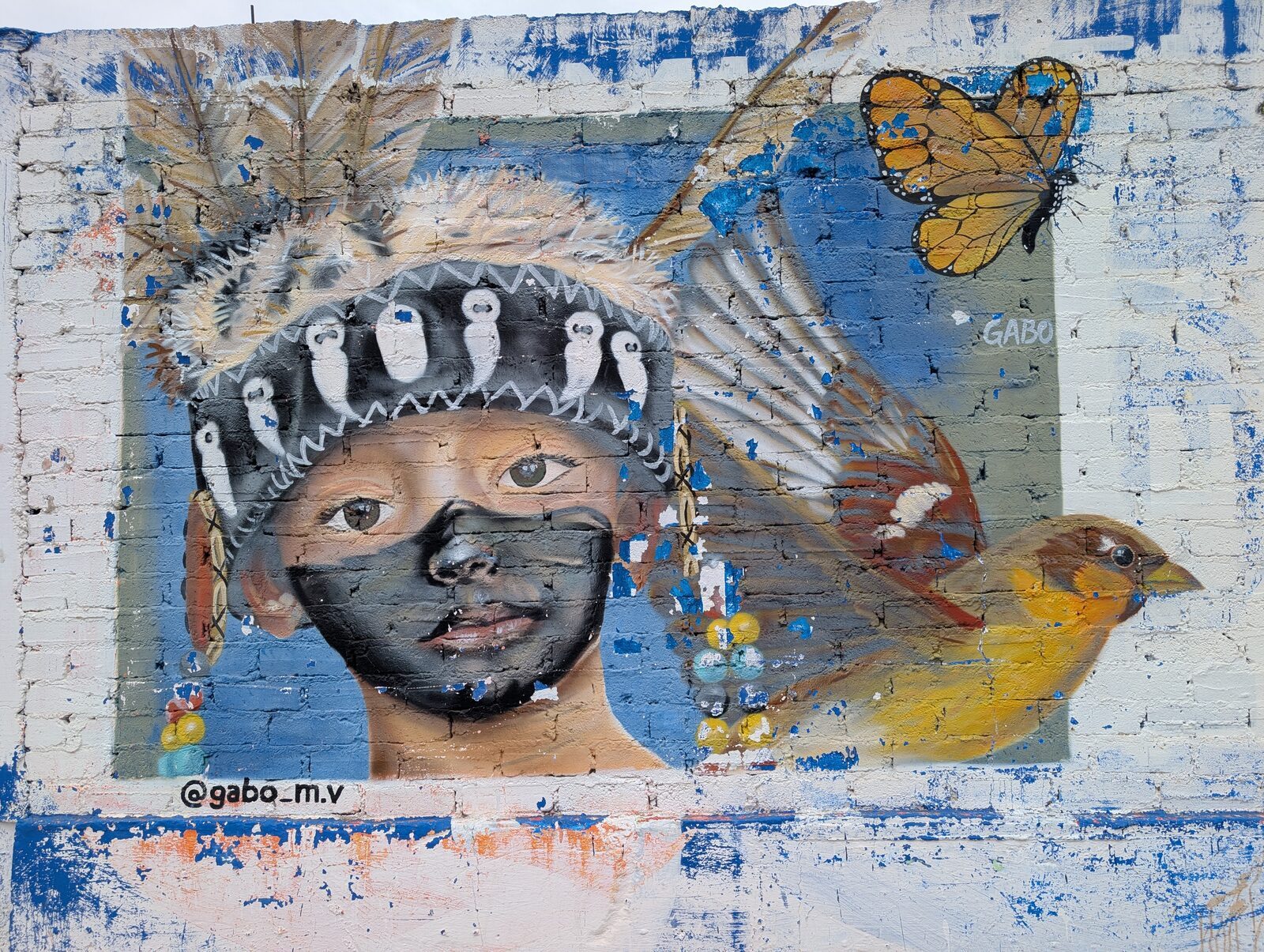 Child in feather headdress