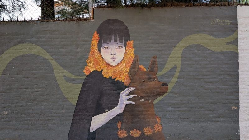 Girl with marigold cowl