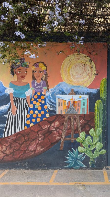Two women and easel