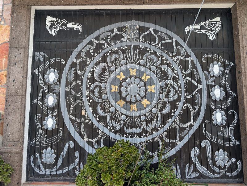 Serpent-flanked mandala