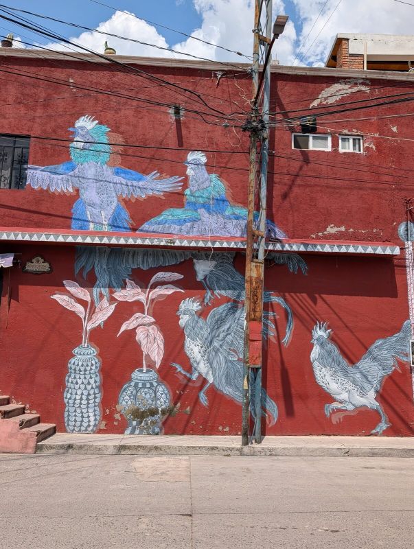 Crowned roosters and vessels