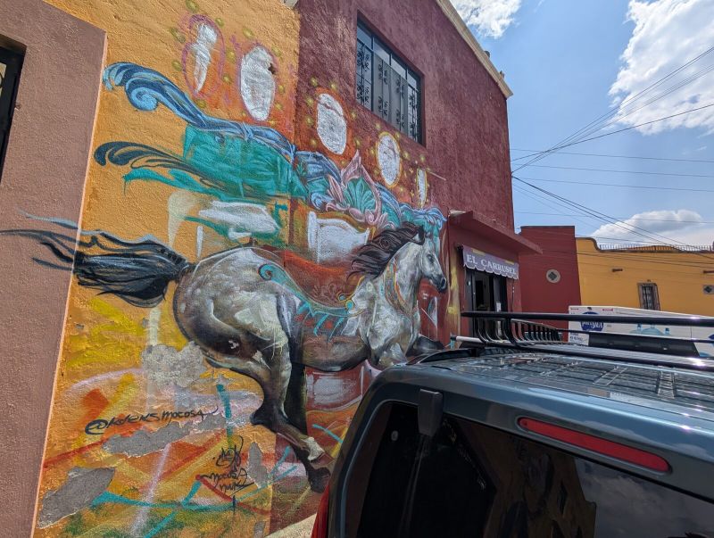 Galloping carousel horse