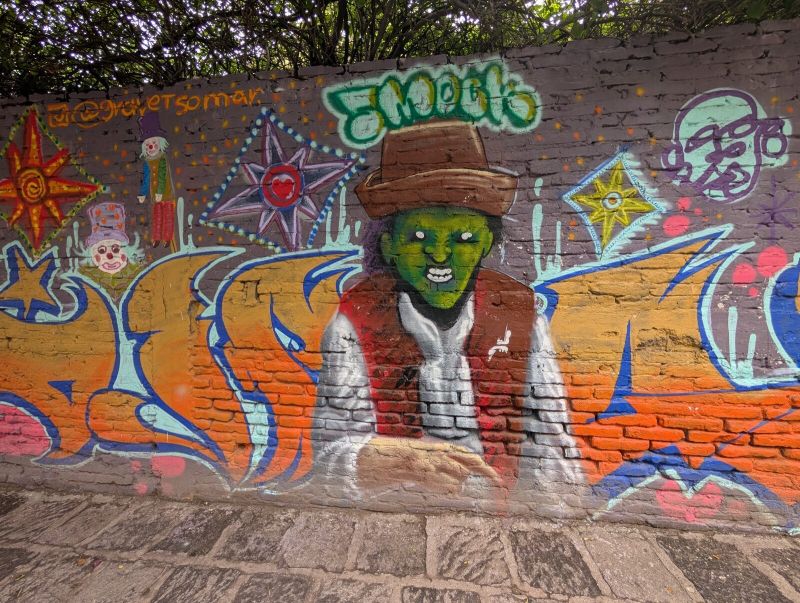 Green-faced man with stars