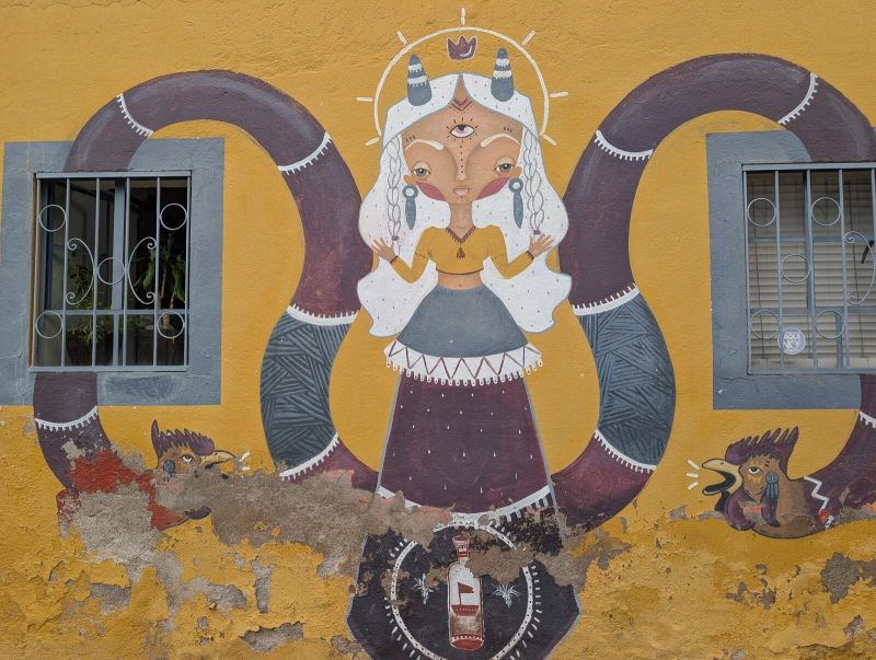 Three-eyed horned woman