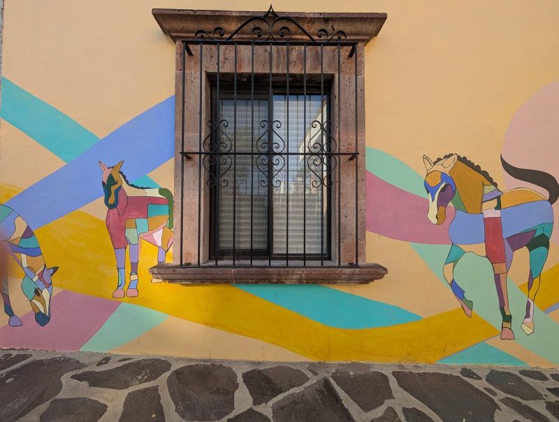 Geometric color-block horses