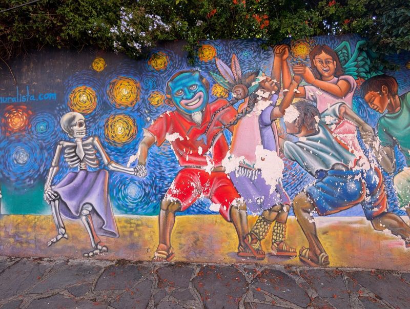 Dancing skeleton and devil
