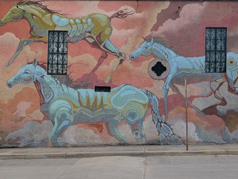 Galloping stylized horses