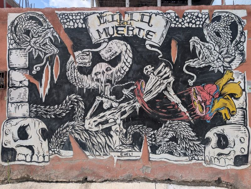 Skeleton and feathered serpents