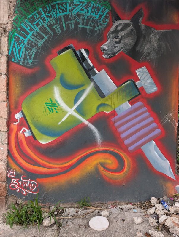 Tattoo machine and dog