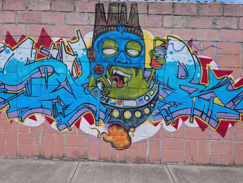 Aztec character with spray can