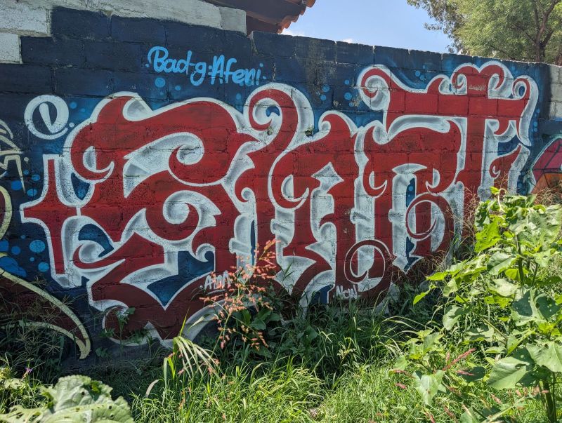 Ornate red lettering
