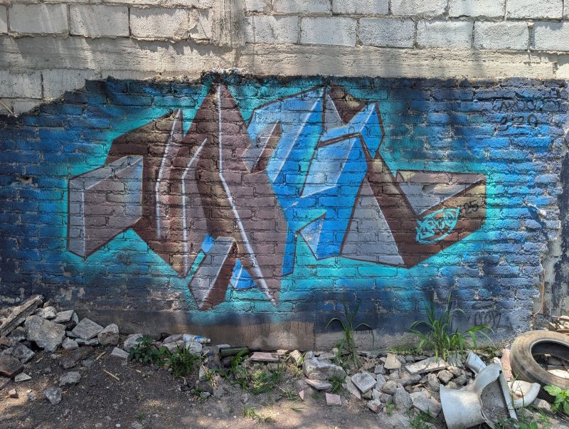 Angular blue letterforms