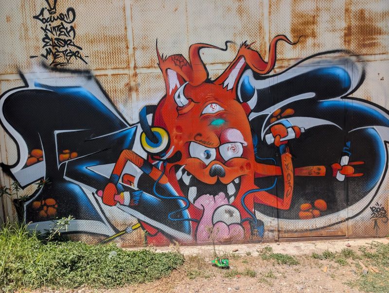 Three-eyed devil with cans