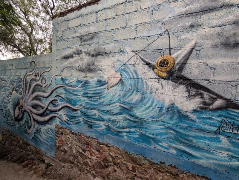 Kraken and paper boat