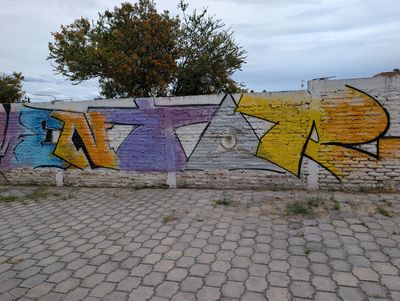 Grafiti de letras con un ojo